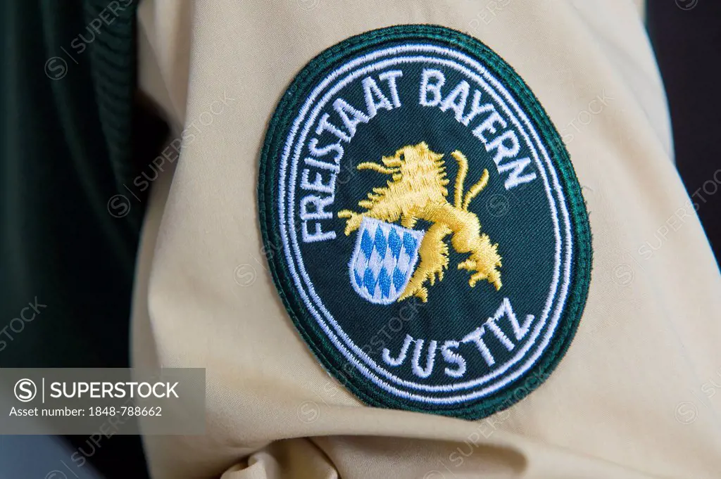 Patch with the Bavarian crest and text Freistaat Bayern Justiz, German for Free State of Bavaria Justice, correctional officer in a prison, JVA, Strau...