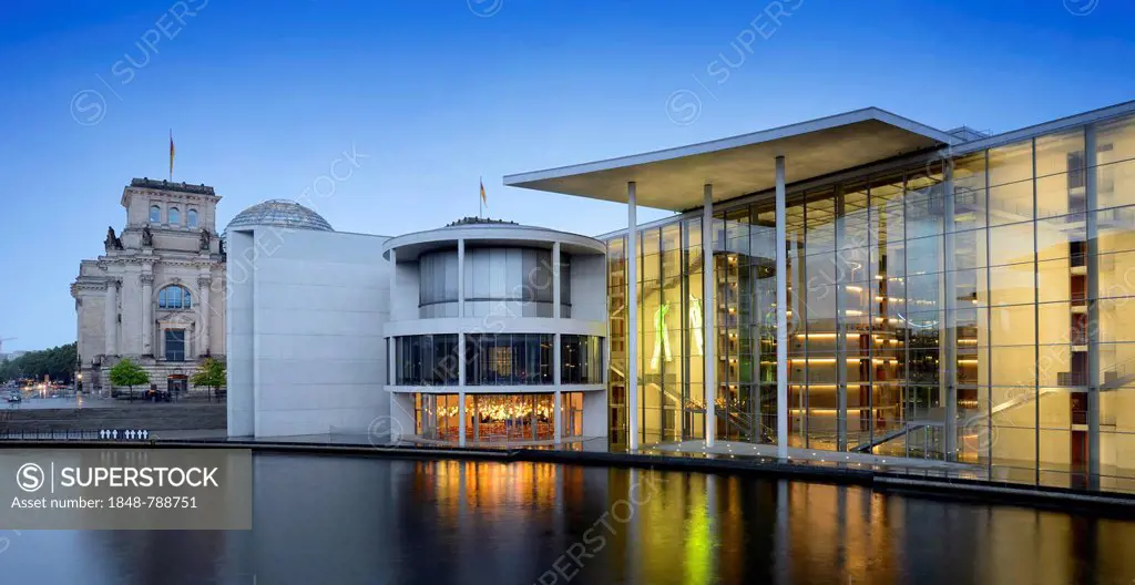 Reichstag Building and Paul Loebe House at the blue hour, with the Spree River at the front