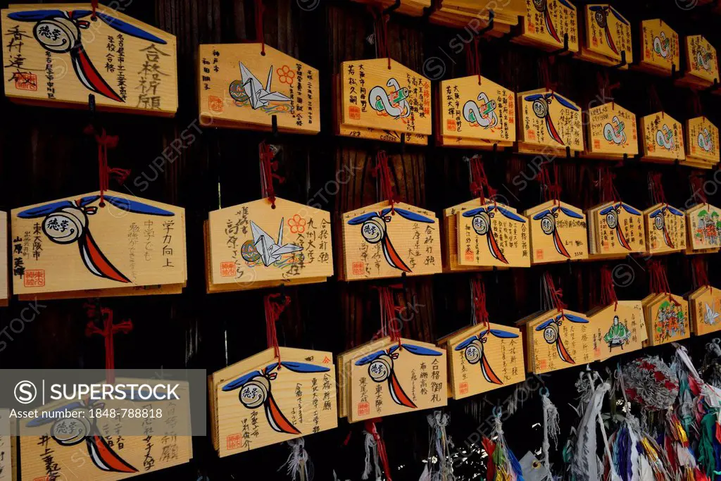 Wall with wishing plaques or Ema, Fushimi Inari Taisha Shinto shrine