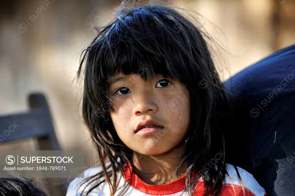 Girl, 8, portrait, in a community of Guarani Indians