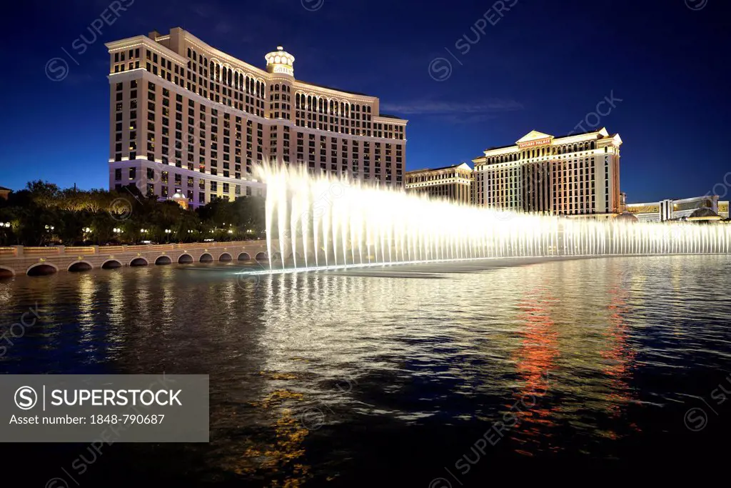 Night scene, fountain display, luxury hotels and casinos, Bellagio, Caesar's Palace, The Mirage
