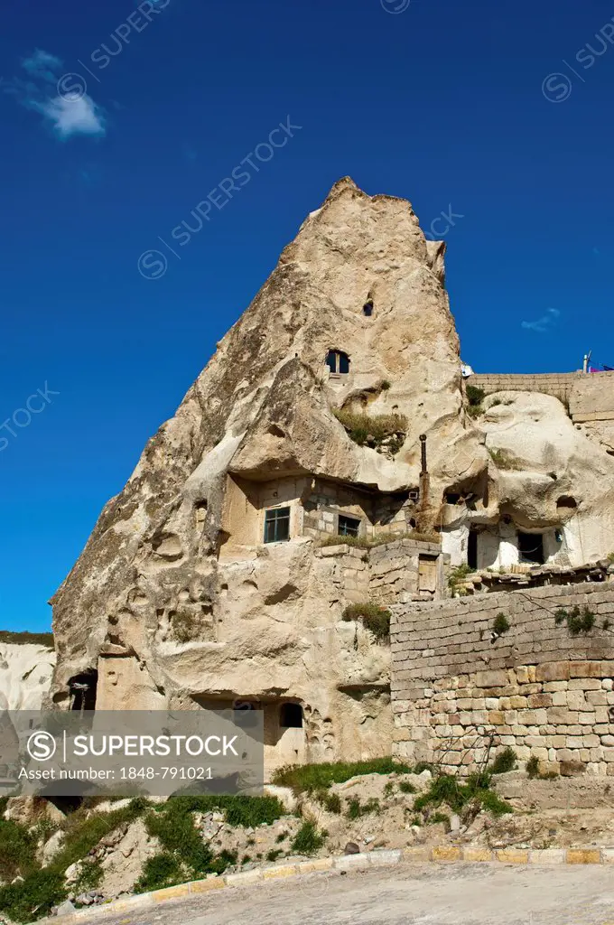 Cave dwellings in hollowed tuff rock