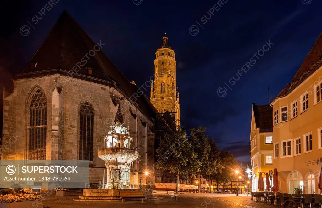 St. George's Church with its steeple called Daniel and the market fountain at night