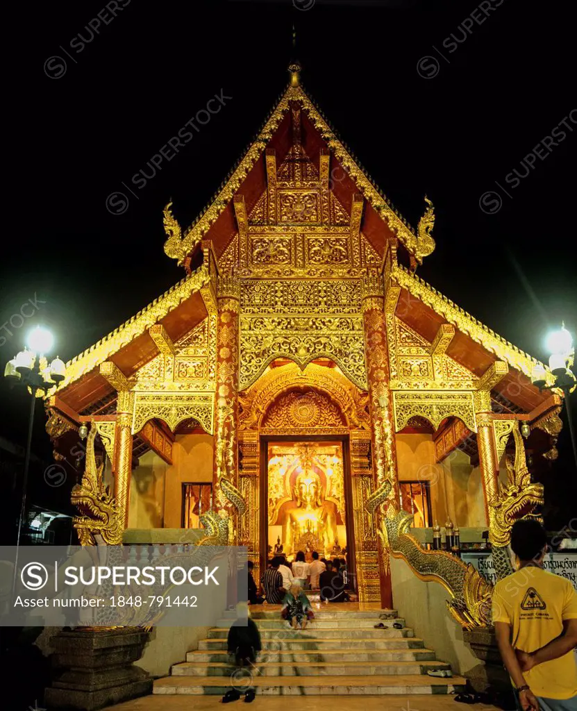 Wat Phra Kaew Temple, Golden Buddha statue illuminated at night