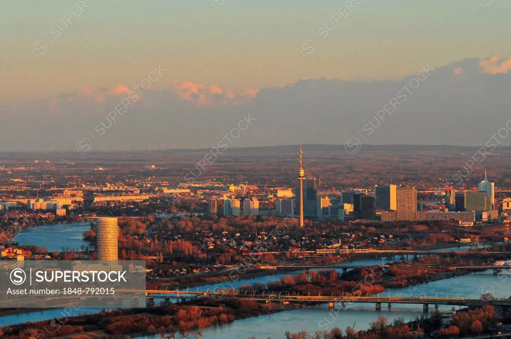 The city of Vienna and the New Danube river at dusk, seen from the Kahlenberg mountain