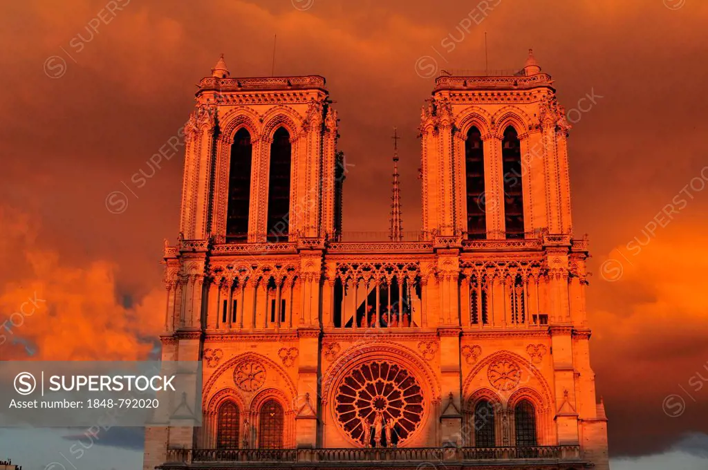 A front view of Notre Dame during sunset