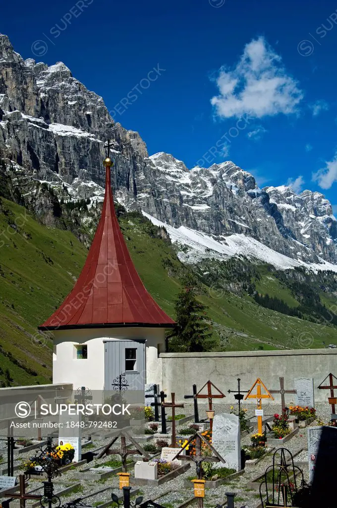 Mountain cemetery at the St. Erhard chapel at the foot of the Glarus Alps