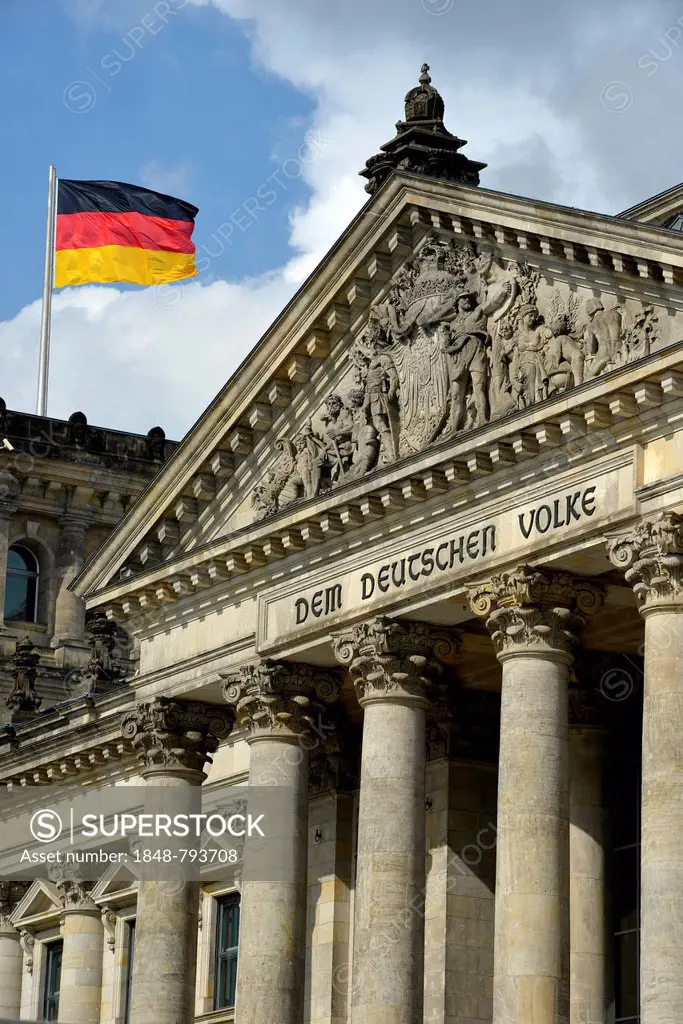 German flag flying on the Reichstag building, parliament, Bundestag, lettering on the tympanum above the main portal Dem Deutschen Volke, German for t...