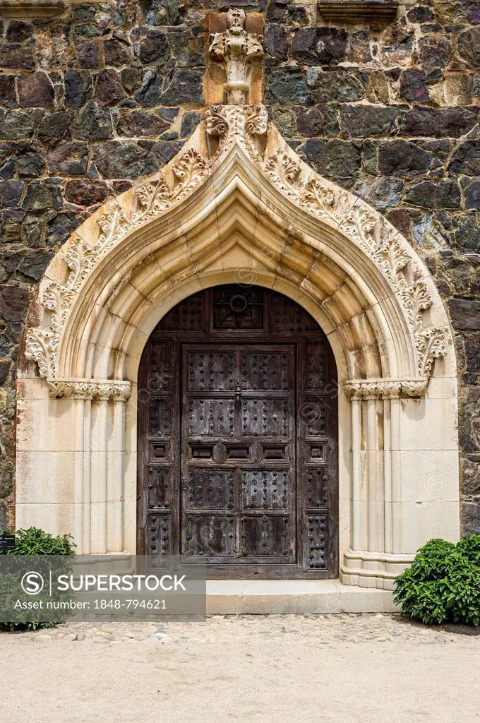 Magnificent front door of Castell de Cap Roig manor, Jardines de Cap Roig