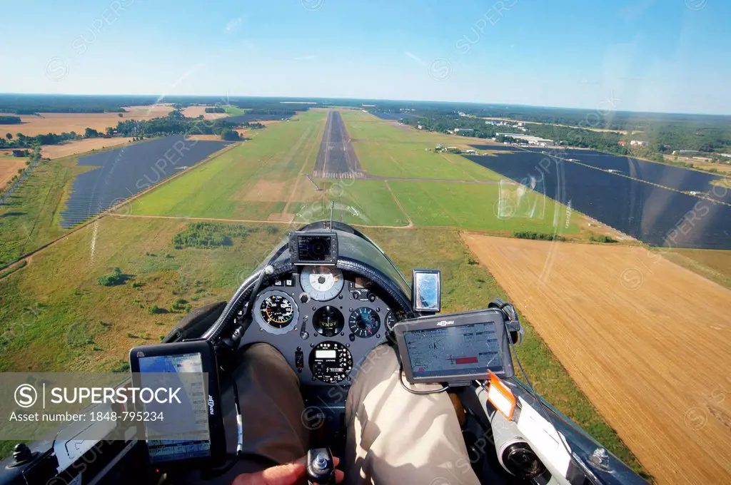 View from the cockpit of a glider, landing approach at the Rothenburg airfield in Upper Lusatia