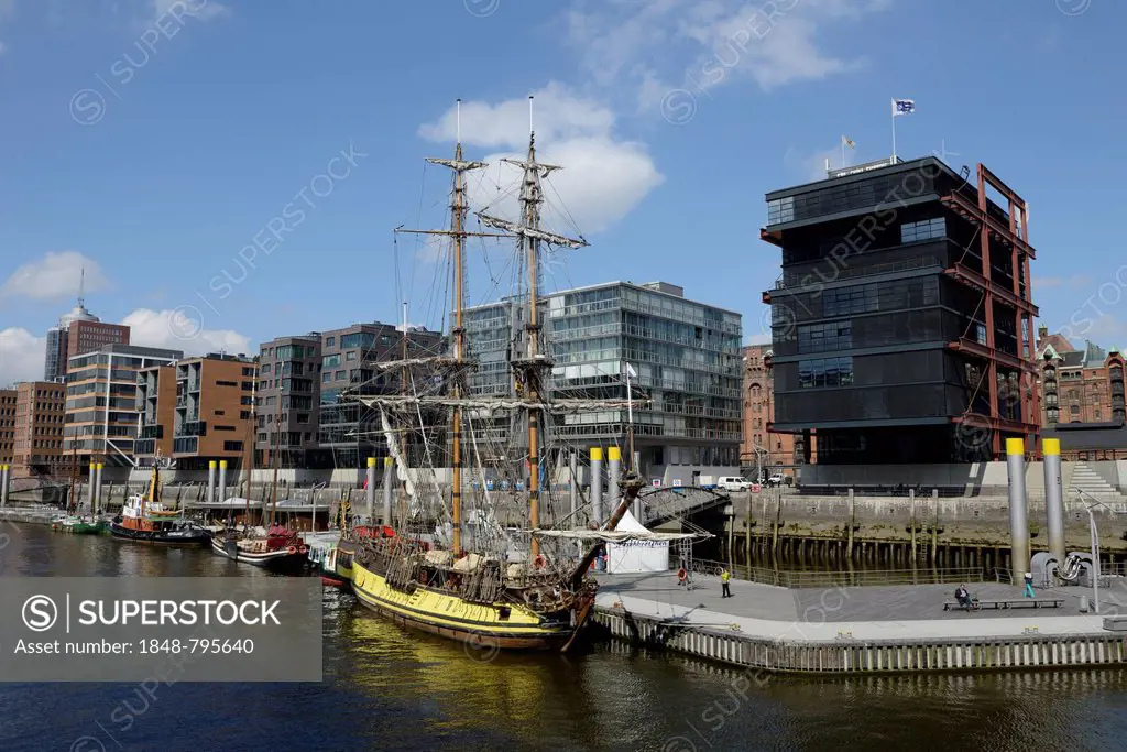 A historic tall ship is moored in the Tall Ship Harbour, Traditionsschiffhafen harbour, modern residential and office buildings, Sandtorhafen harbour,...