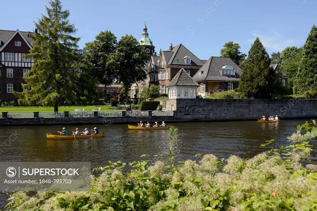 St. Johannis monastery, kayakers paddling on the Alster river, Leinpfad walkway