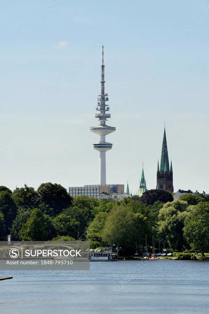 Alster river steamer on the Aussenalster or Outer Alster Lake, television tower