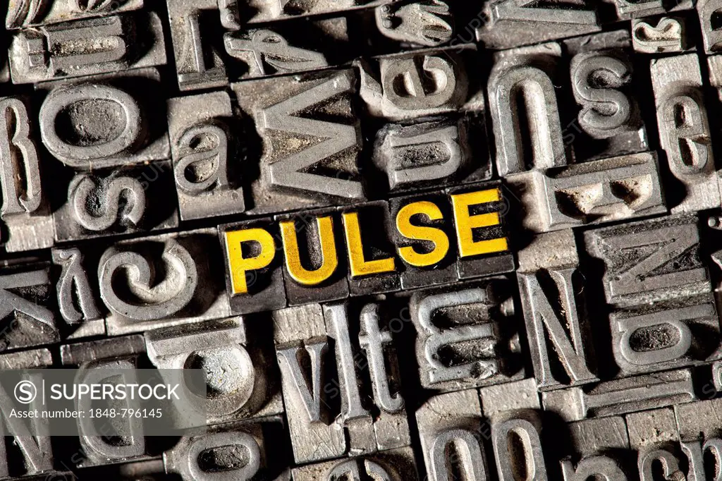 Old lead letters forming the word PULSE