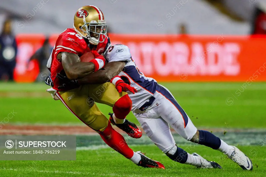 TE Delanie Walker, #46 49ers, is tackled during the NFL International game between the San Francisco 49ers and the Denver Broncos on October 31, 2010 ...
