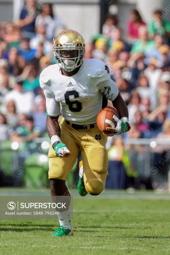 RB Theo Riddick, #6 Notre Dame, runs with the ball during the NCAA football game between the Navy and the Notre Dame on September 1, 2012 in Dublin, I...