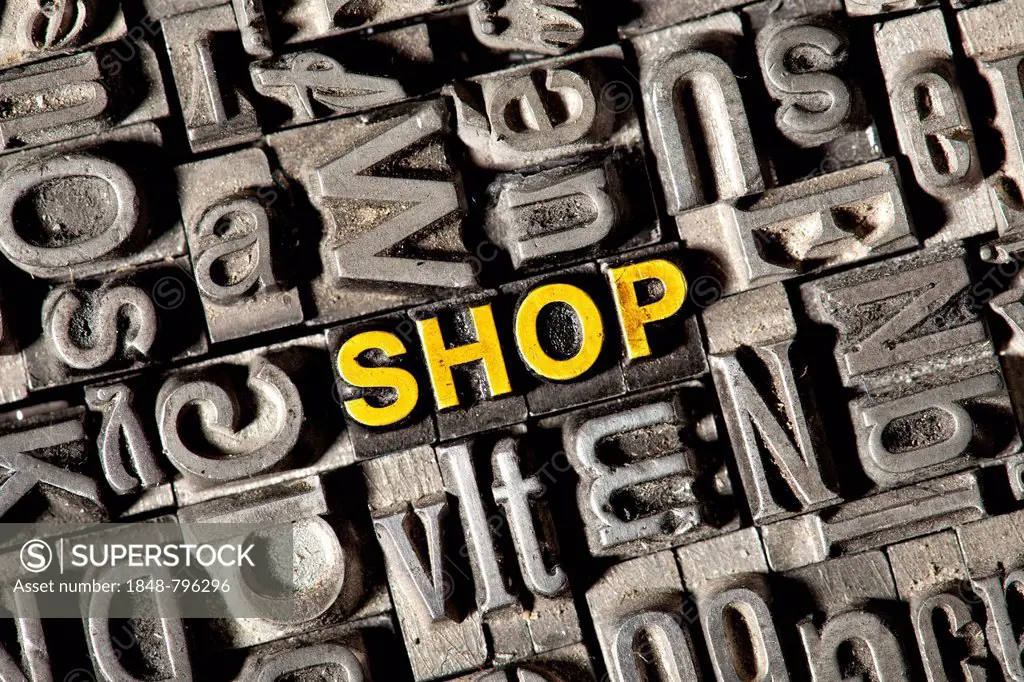 Old lead letters forming the word SHOP