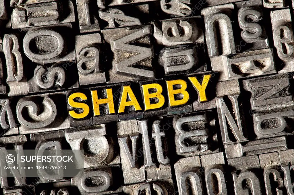 Old lead letters forming the word SHABBY