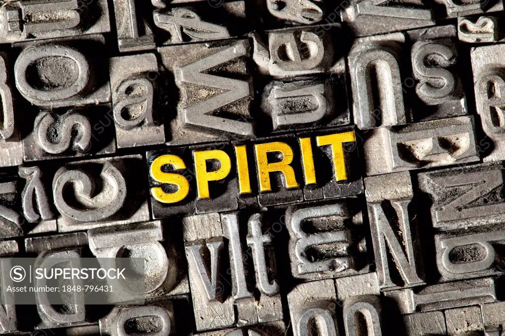Old lead letters forming the word SPIRIT