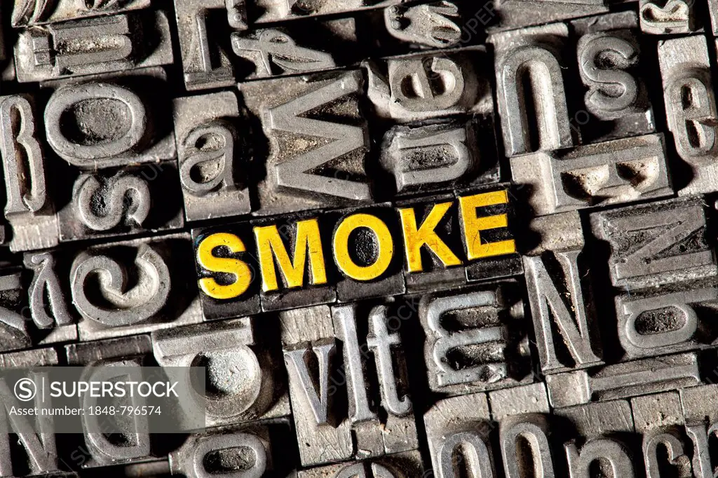 Old lead letters forming the word SMOKE