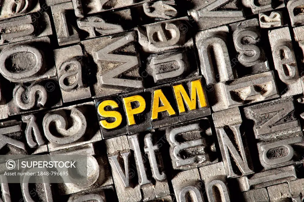 Old lead letters forming the word SPAM