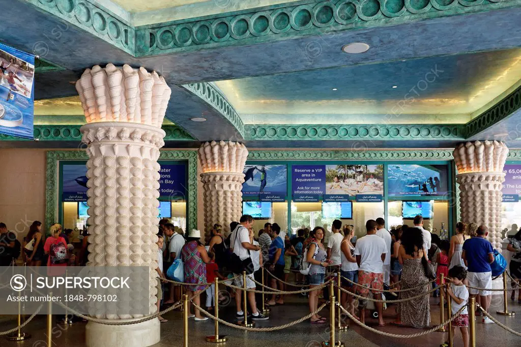Monumental portico entrance with a queue to the Aquaventure theme park, Atlantis Hotel, The Palm Jumeirah, Dubai, United Arab Emirates, Middle East, A...