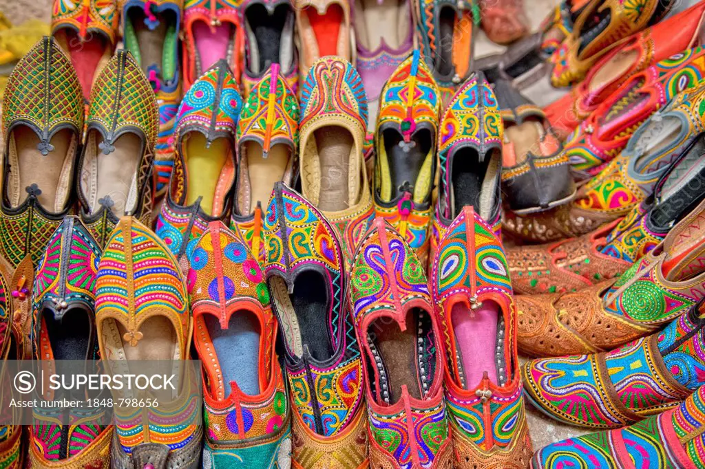 Colourful embroidered traditional shoes at the market