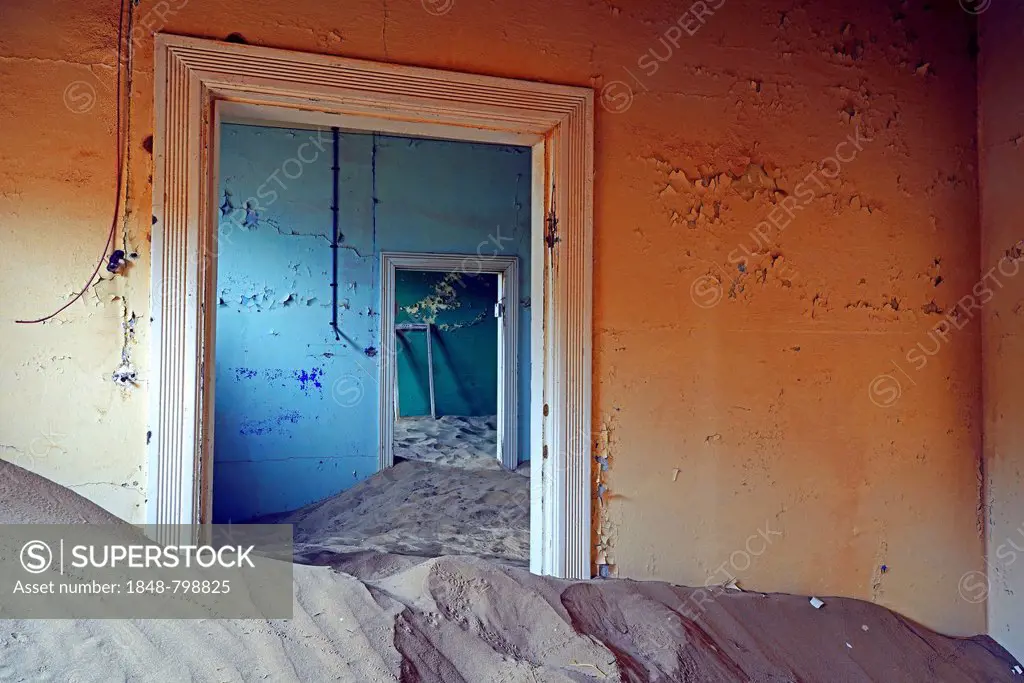 Building taken over by sand from the desert, former diamond mining town, now a ghost town