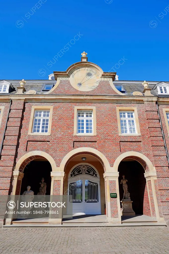 Sundial above the entrance, Schloss Nordkirchen palace, a baroque moated castle accommodating Fachhochschule für Finanzen NRW university