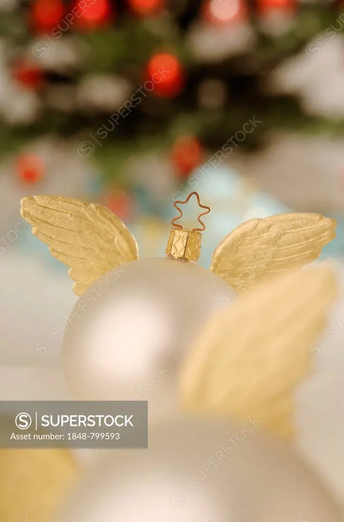 Still life, Christmas baubles with golden wings