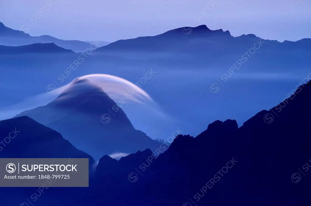 Peaks at the blue hour with rolling cloud, Lenticularis, Warth, Vorarlberg, Austria, Europe