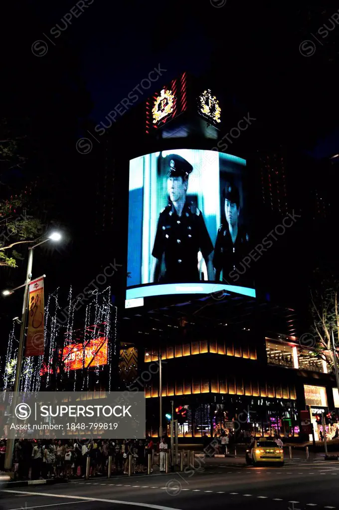 Large advertising screen at night, Orchard Road, Central Area, Central Business District, Singapore, Asia