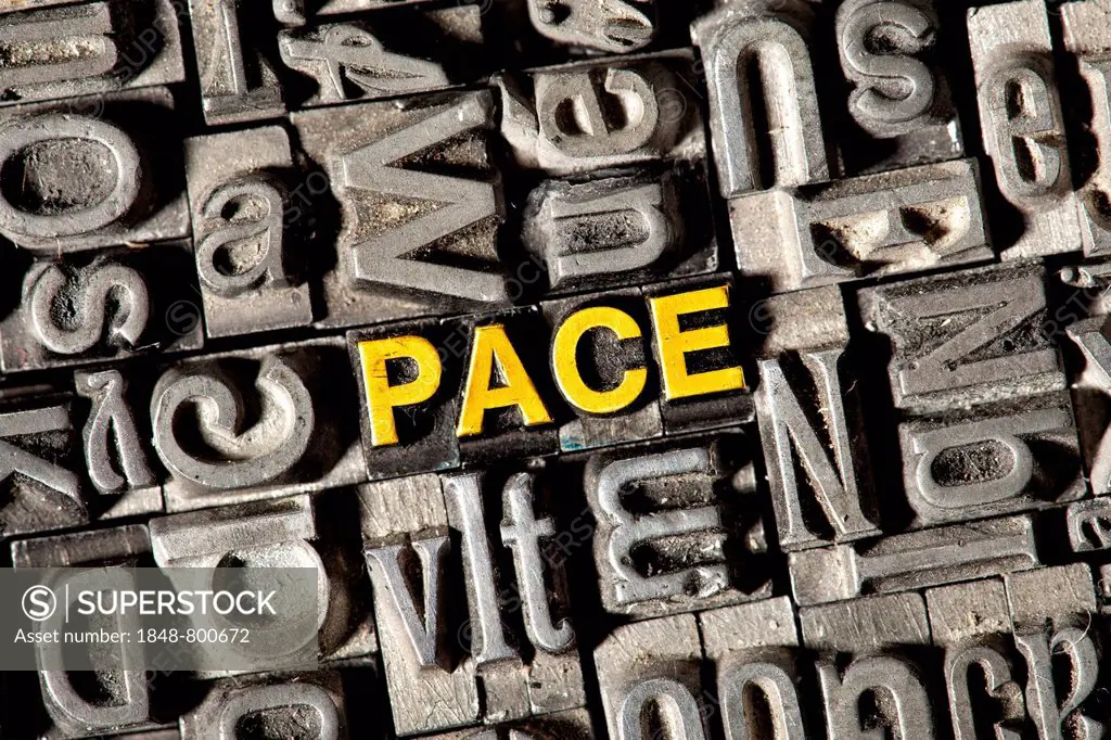 Old lead letters forming the word &quot;PACE&quot;