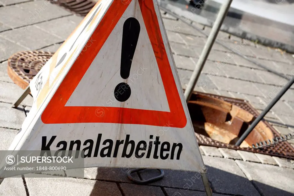 Warning sign, lettering Kanalarbeiten, German for drain works in the historic district of Ellwangen an der Jagst, Baden-Wuerttemberg, Germany, Europe