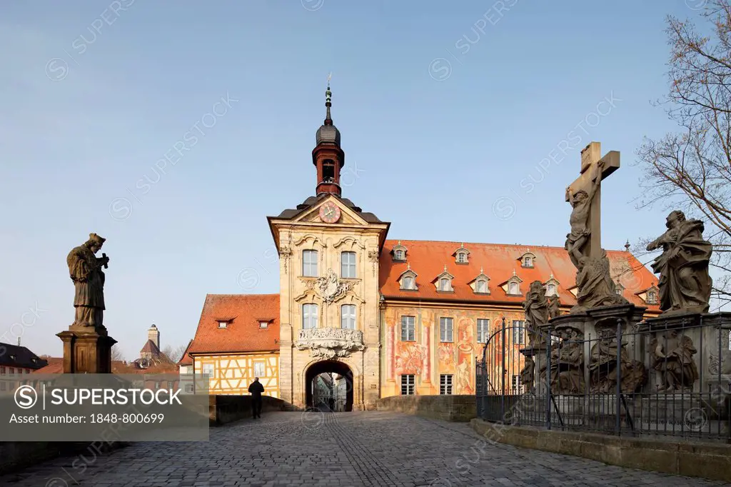 Old town hall on the Regnitz river, gate at the Obere Bruecke bridge with the statue of St. Nepomuk and the crucifixion group, Bamberg, Upper Franconi...