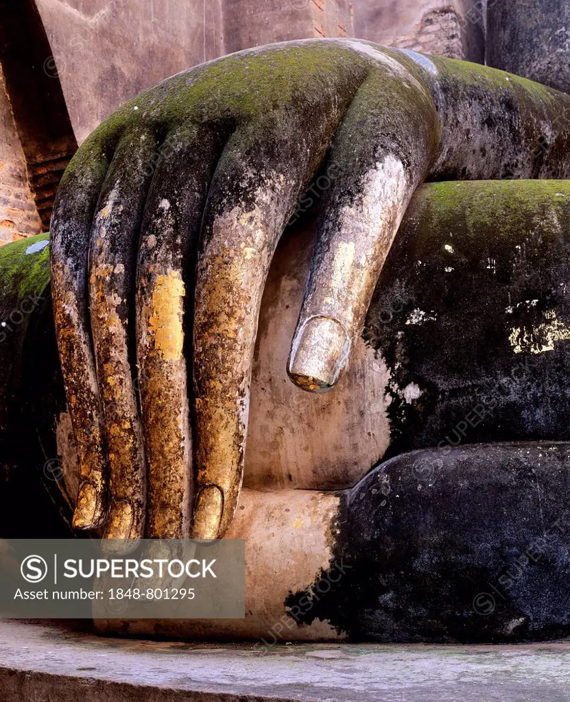 Hand of the Buddha statue Phra Achana, decorated with gold leaf, Wat Si Chum, Sukhothai Historical Park, Sukhothai, Sukhothai Province, Northern Thail...