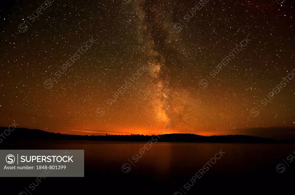 Starry sky with the Milky Way glowing, over a lake, Algonquin Provincial Park, Ontario Province, Canada