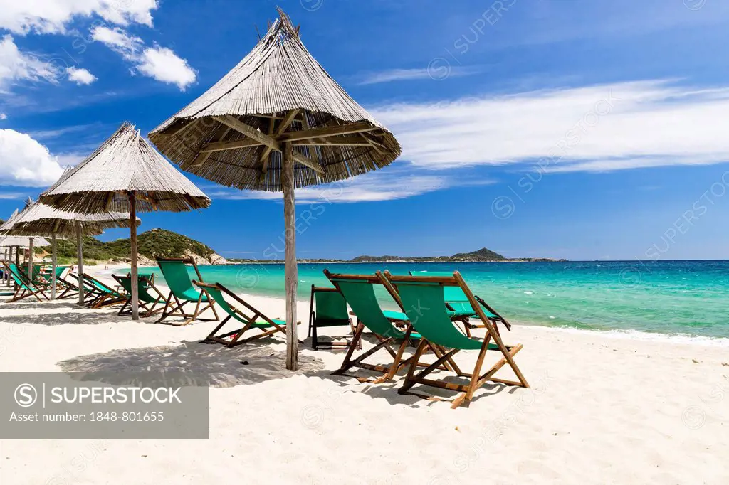 Sun loungers and umbrellas on the beach, Spiaggia di Campus, Villasimius, Sardinia, Italy