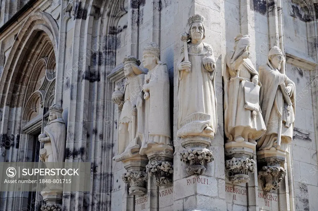 Sculptures on the tower of the historic Town Hall, Cologne, Rhineland, North Rhine-Westphalia, Germany