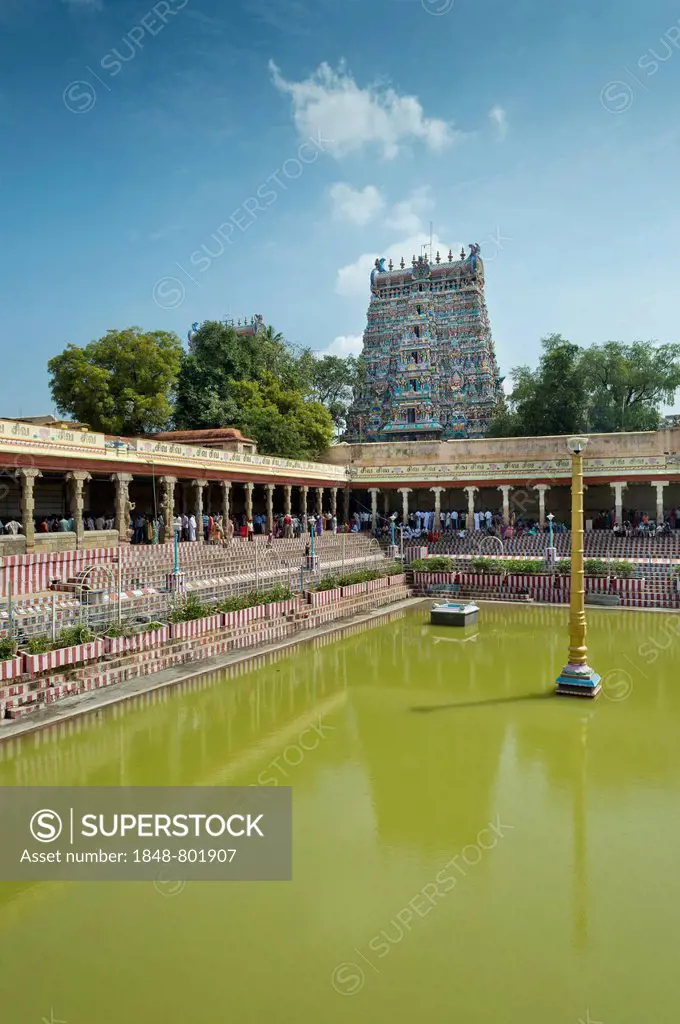 Temple pond, Gopuram or Gopura temple gate, temple district, Meenakshi Amman Temple or Sri Meenakshi Sundareswarar Temple, Madurai, Tamil Nadu, India