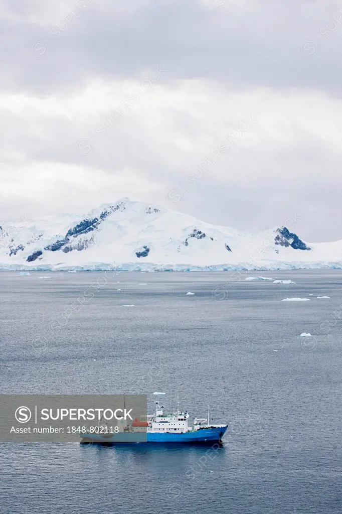 Russian research ship, snow-covered mountains, Antarctica