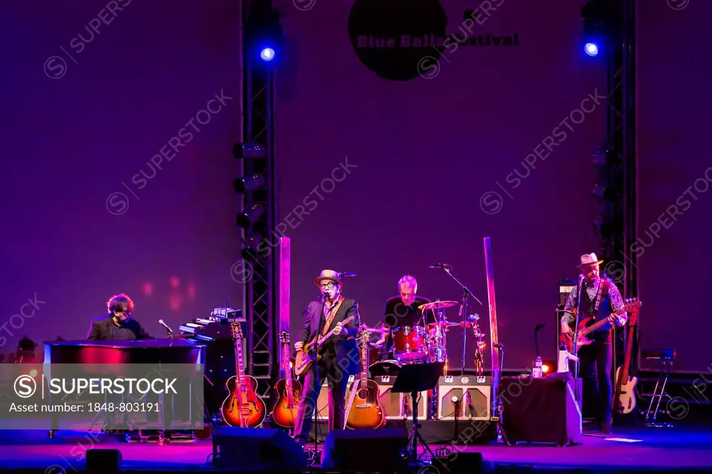 British singer-songwriter Elvis Costello and his band, performing live at the Blue Balls Festival, Luzerner Saal KKL concert hall