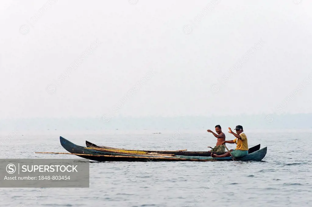 Two fishermen in their boats, waving