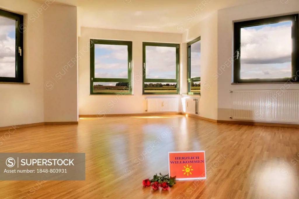 Welcome sign and roses on the floor, large living room with windows and light parquet flooring, compositing, rental apartment, real estate, freehold f...