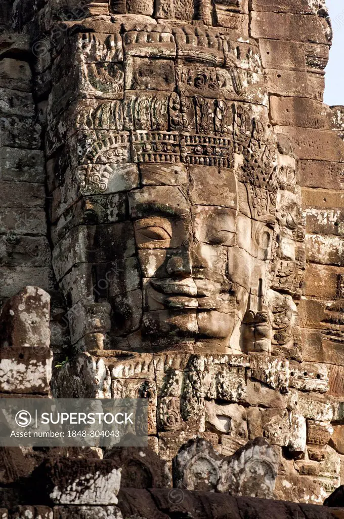 Smile of Angkor, huge face carved in stone on a tower, Bayon Temple, Angkor Thom, Siem Reap, Cambodia, Southeast Asia, Asia