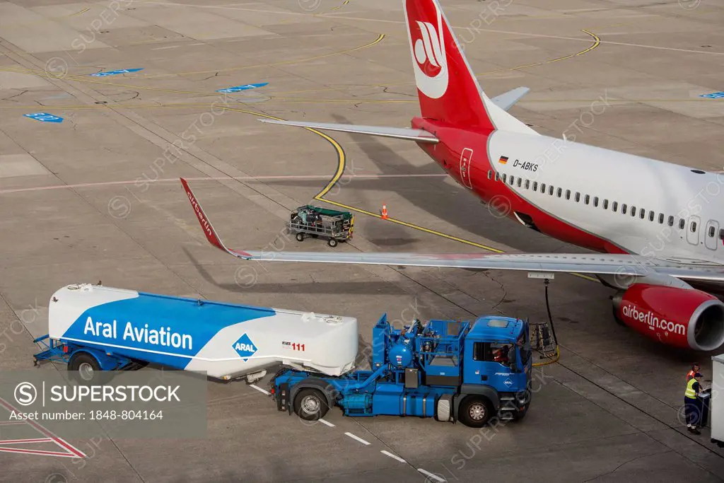 Airberlin aircraft being fuelled by tanker, Duesseldorf International Airport, North Rhine-Westphalia, Germany, Europe