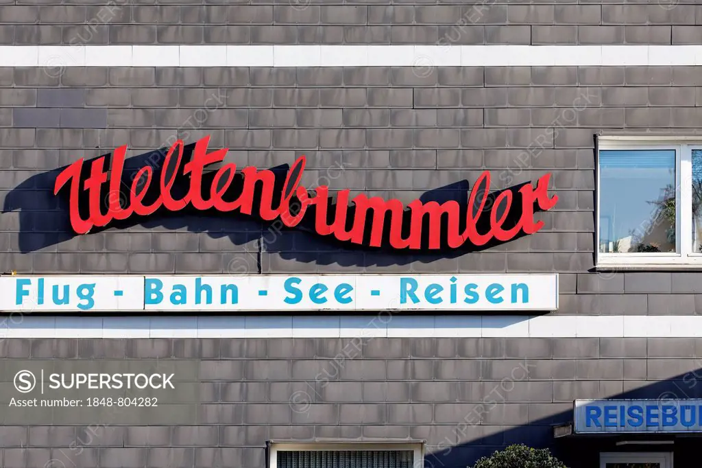 Weltenbummler, German for Globetrotter, old-fashioned lettering on a travel agency, Duisburg-Bruckhausen, Ruhr area, North Rhine-Westphalia, Germany, ...