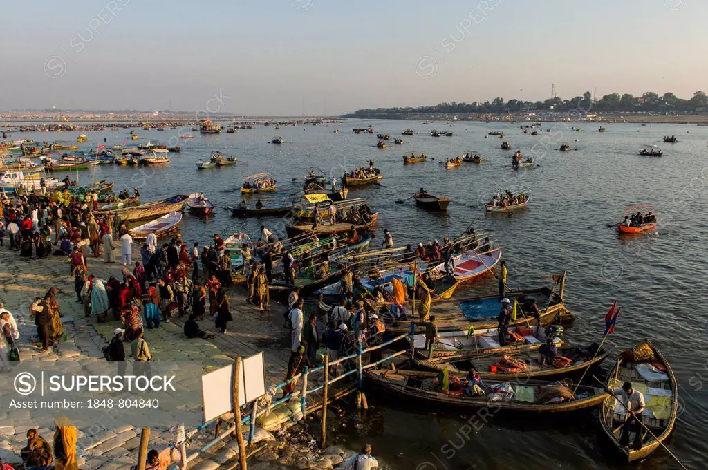 Boats to ship people to the Sangam, the confluence of the rivers Ganges, Yamuna and Saraswati, during Kumbha Mela, Allahabad, Uttar Pradesh, India