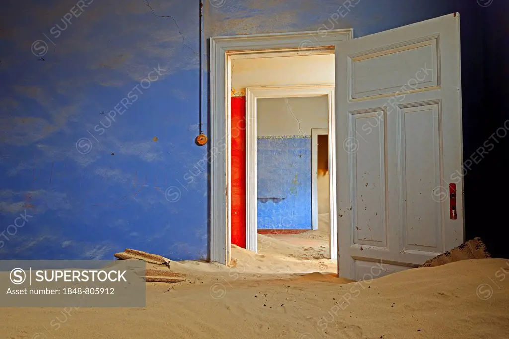 Room in a house that has been filled by desert sand, in the former diamond city of Kolmanskuppe, now a ghost town, Kolmanskop, Karas Region, Namibia