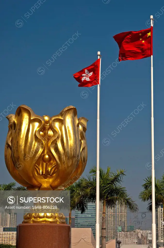 Sculpture of a gilded eternal Bauhinia flower with the flags of Hong Kong and China, China's reunification gift to Hong Kong, 1997, Hong Kong, Hong Ko...